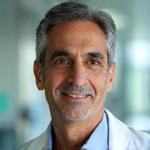 Portrait of Dr. Aaron Patel, Chief Medical Officer