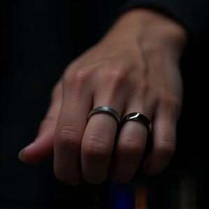 Oura Ring on a finger, showing its sleek design